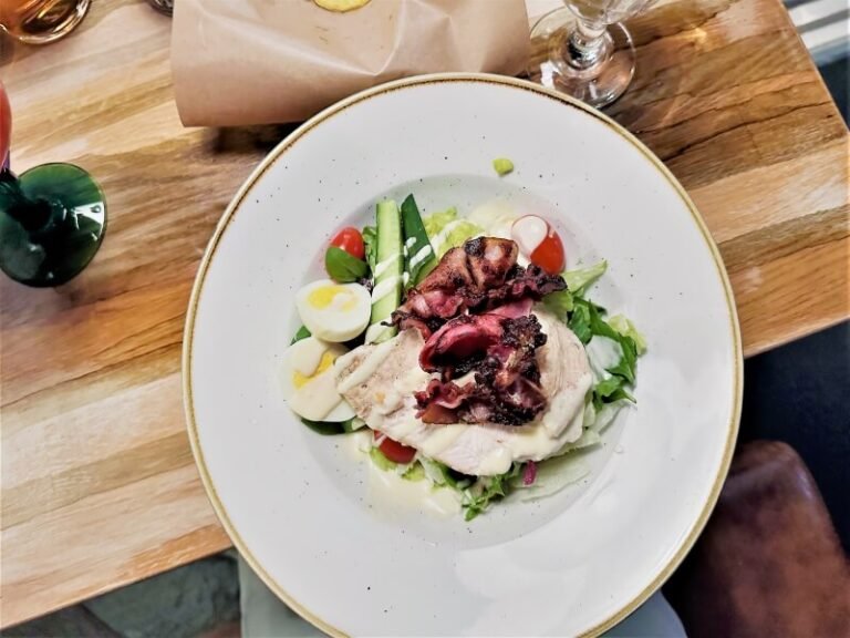 A plate of chicken salad in a restaurant in Rovaniemi Lapland